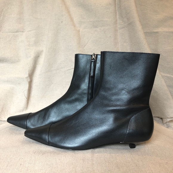 zara flat ankle boots with toe cap detail